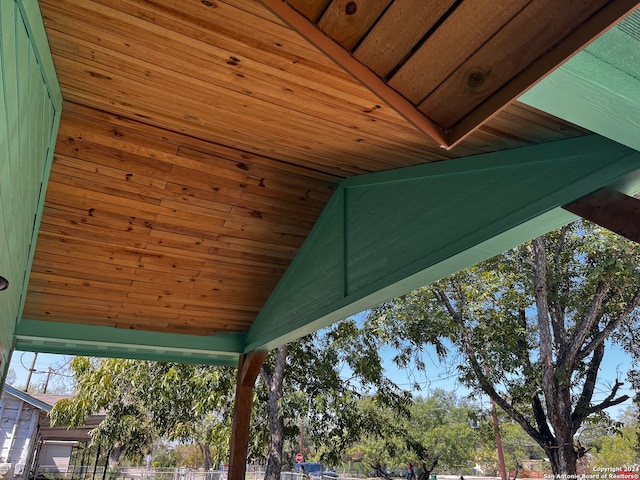 exterior details featuring wooden ceiling