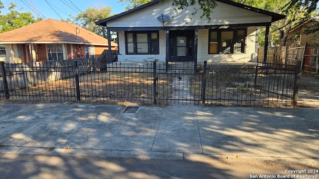 bungalow featuring covered porch