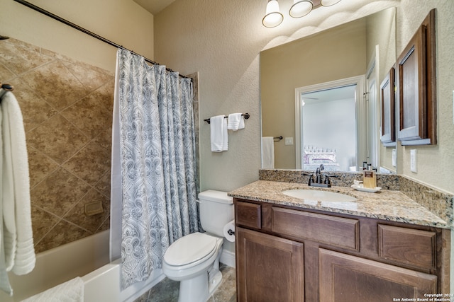 full bathroom with vanity, toilet, and shower / bath combo