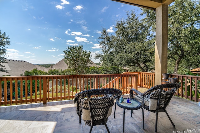 wooden terrace featuring a mountain view