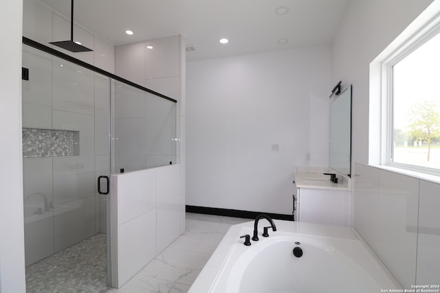 bathroom with vanity and plus walk in shower