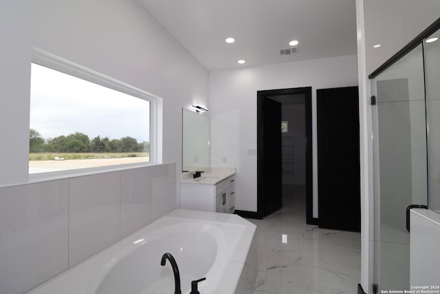 full bathroom featuring visible vents, recessed lighting, marble finish floor, a garden tub, and vanity