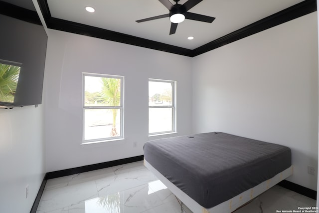 bedroom with ceiling fan and ornamental molding