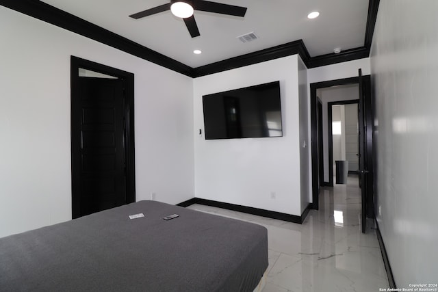 unfurnished bedroom with ornamental molding and ceiling fan