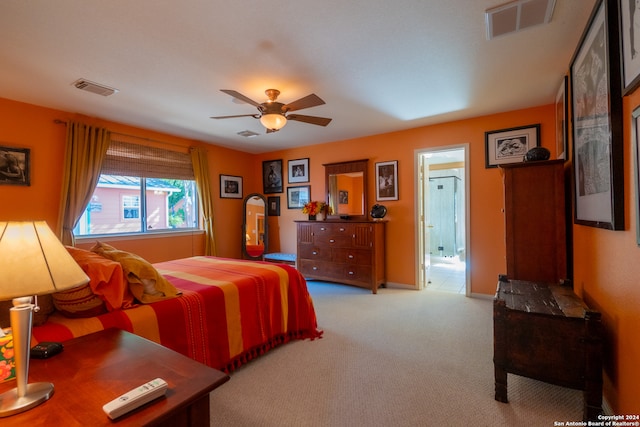 bedroom with light colored carpet and ceiling fan