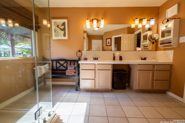 bathroom with tile patterned flooring and vanity