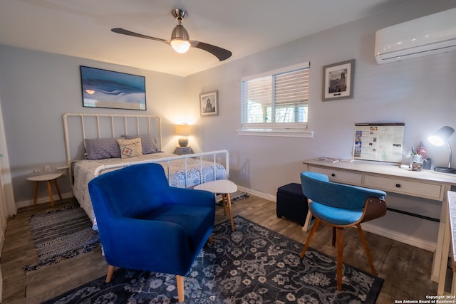 bedroom with ceiling fan, a wall mounted AC, and dark hardwood / wood-style flooring