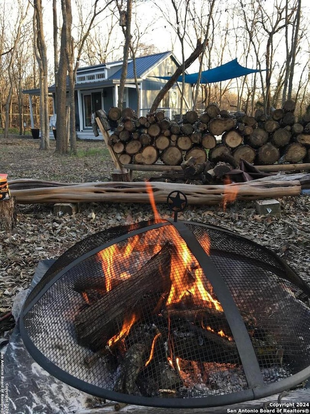 exterior details with a fire pit