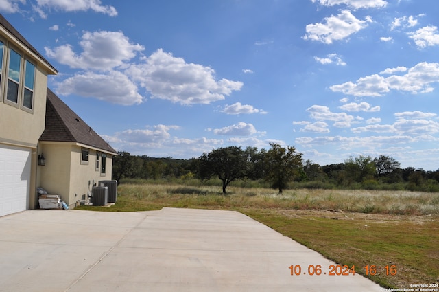 view of yard with a garage