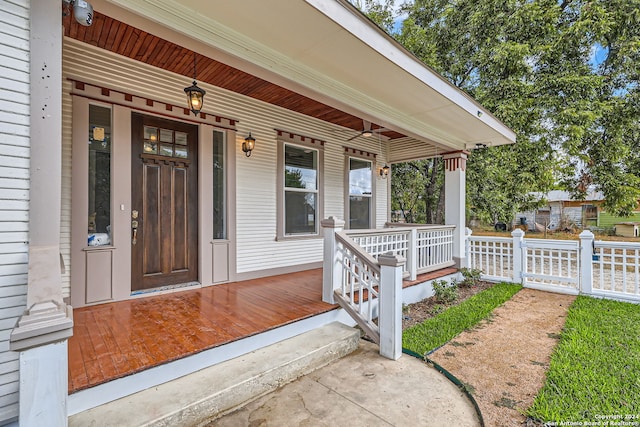 doorway to property featuring covered porch