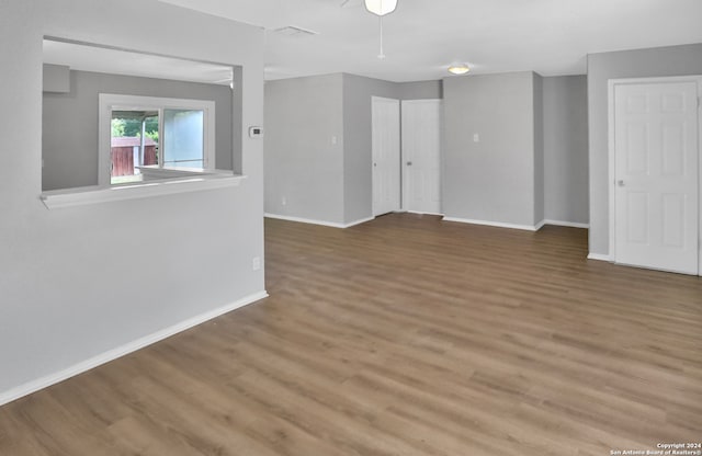 spare room featuring hardwood / wood-style floors