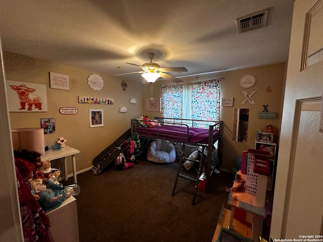 bedroom with ceiling fan and carpet floors