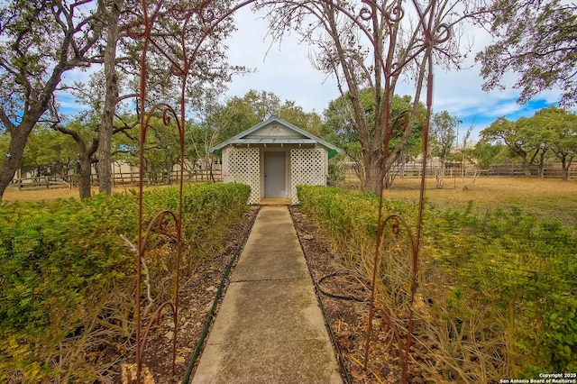 exterior space featuring a shed