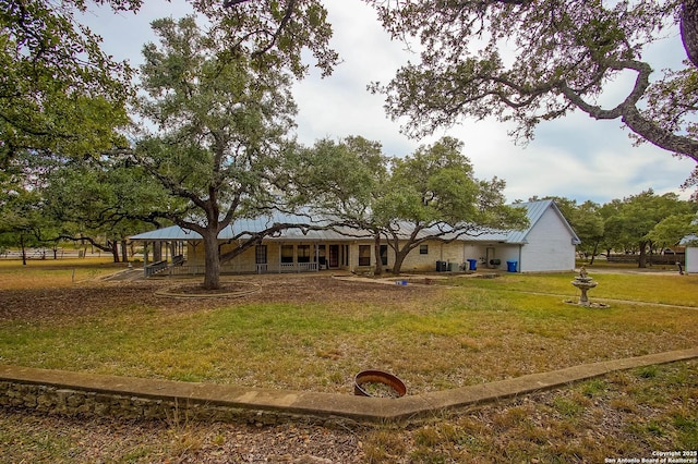 exterior space featuring a gazebo and a front yard