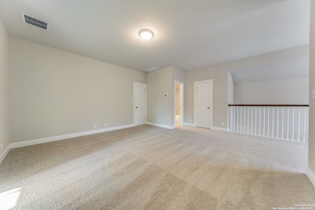 unfurnished room featuring carpet flooring