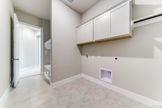 washroom with electric dryer hookup, baseboards, hookup for a gas dryer, washer hookup, and cabinet space