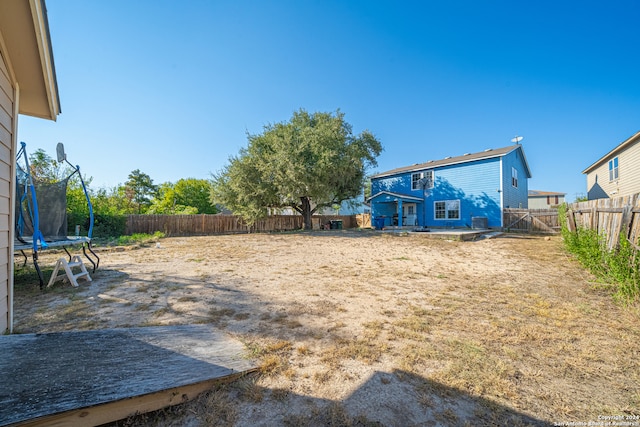 view of yard featuring a trampoline