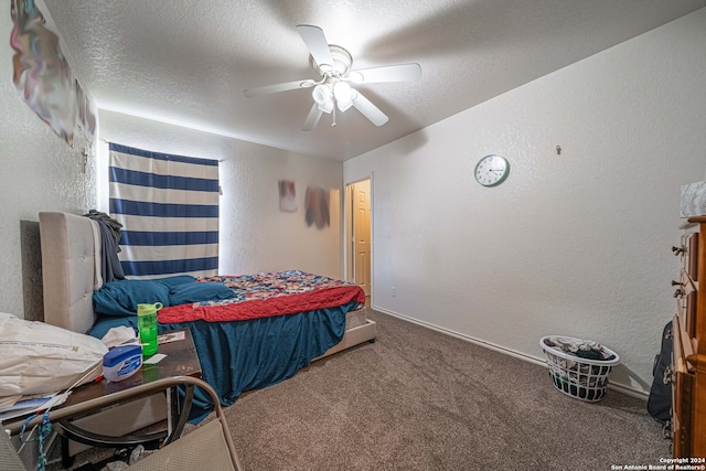 bedroom featuring carpet, a textured ceiling, and ceiling fan