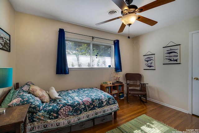 bedroom featuring ceiling fan and wood-type flooring