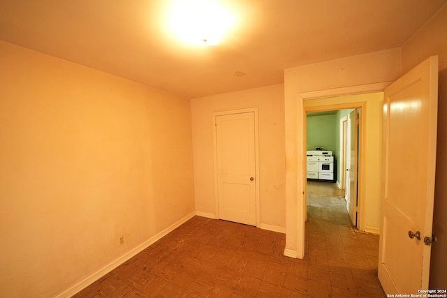 unfurnished bedroom with a closet