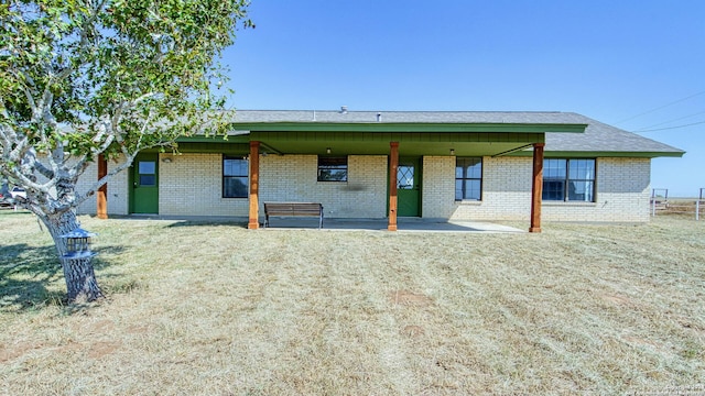 rear view of property with a patio