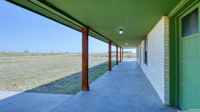 view of patio with a rural view