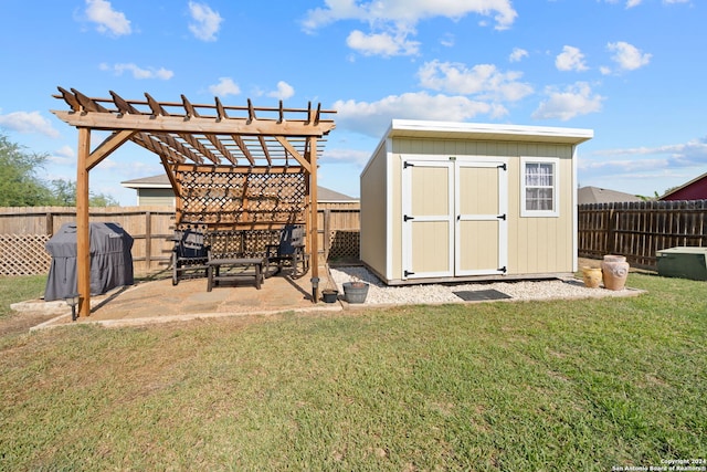 view of outbuilding featuring a pergola and a lawn