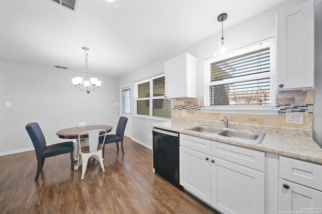 kitchen featuring white cabinets, black dishwasher, decorative light fixtures, and sink