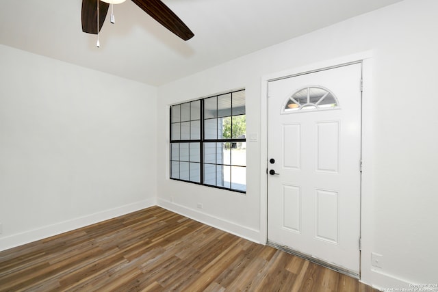 entryway with wood-type flooring and ceiling fan