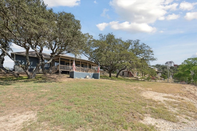 view of yard with a deck