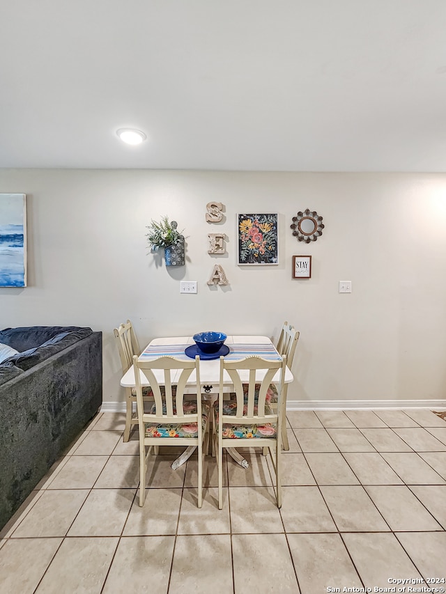 view of tiled dining space