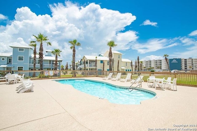 view of pool with a patio area