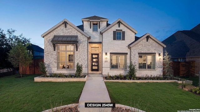 view of front of home with a front yard