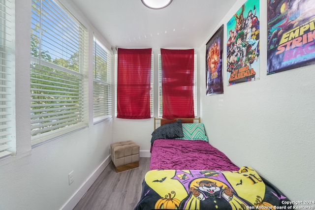 bedroom featuring hardwood / wood-style flooring