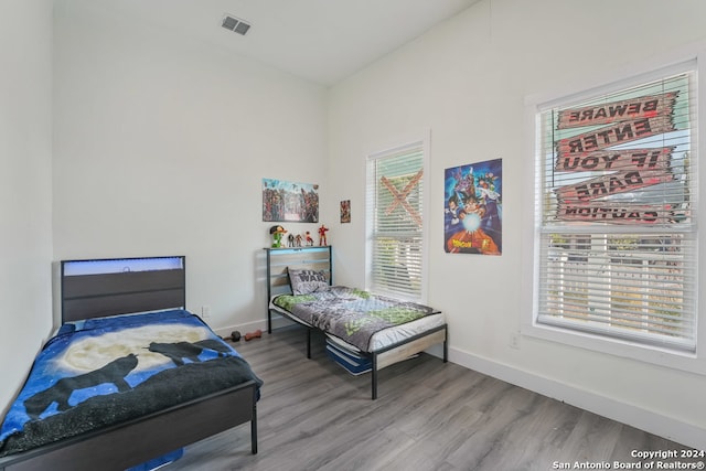 bedroom featuring hardwood / wood-style floors