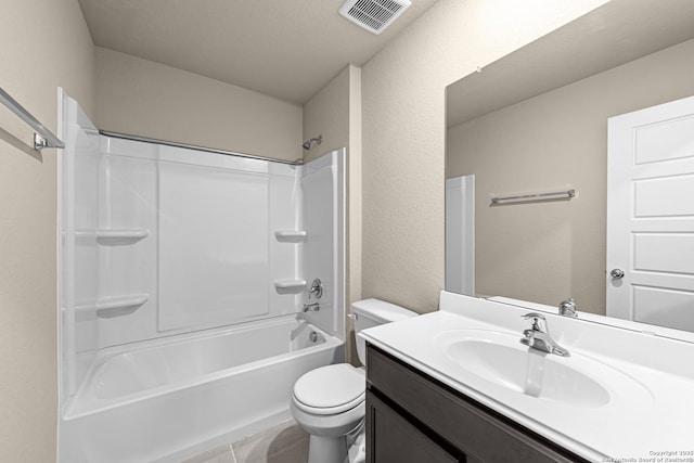 full bathroom featuring shower / washtub combination, vanity, tile patterned floors, and toilet