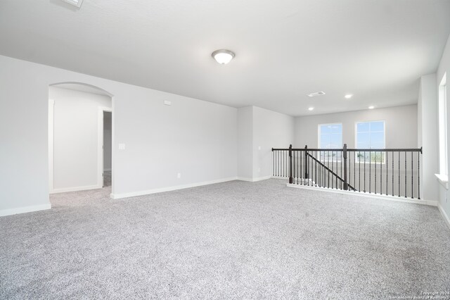 empty room with carpet flooring