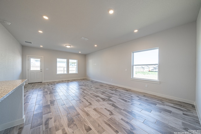 unfurnished room featuring light hardwood / wood-style flooring