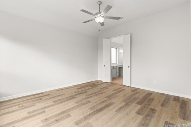 empty room with ceiling fan and light wood-type flooring