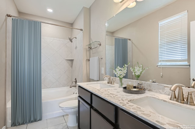 full bathroom with vanity, tile patterned flooring, toilet, and shower / bathtub combination with curtain