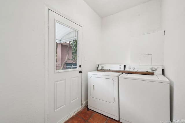 laundry room with washer and clothes dryer