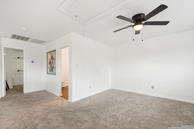 empty room with light carpet and ceiling fan