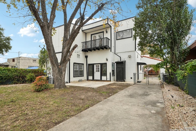 view of front of home with a balcony