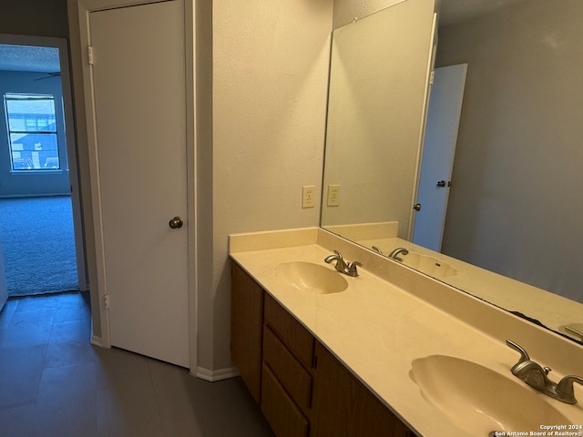 bathroom featuring vanity and tile patterned flooring