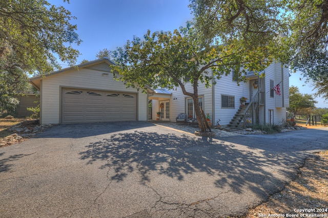 view of front of home with a garage