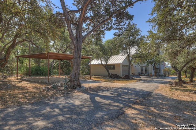 view of yard featuring a carport