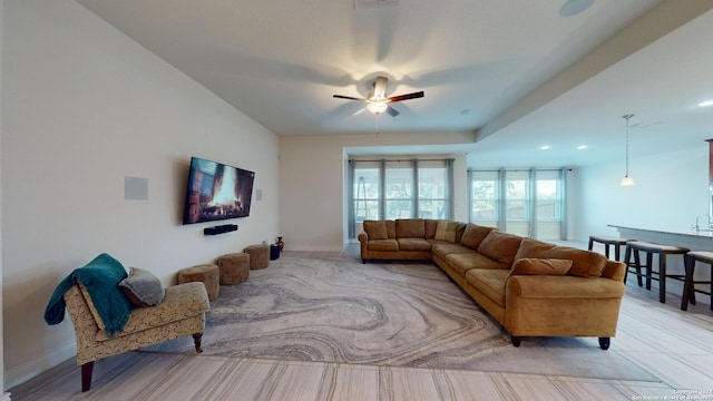 living room featuring ceiling fan