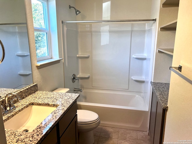 full bathroom featuring vanity, toilet, tile patterned flooring, and shower / bathtub combination