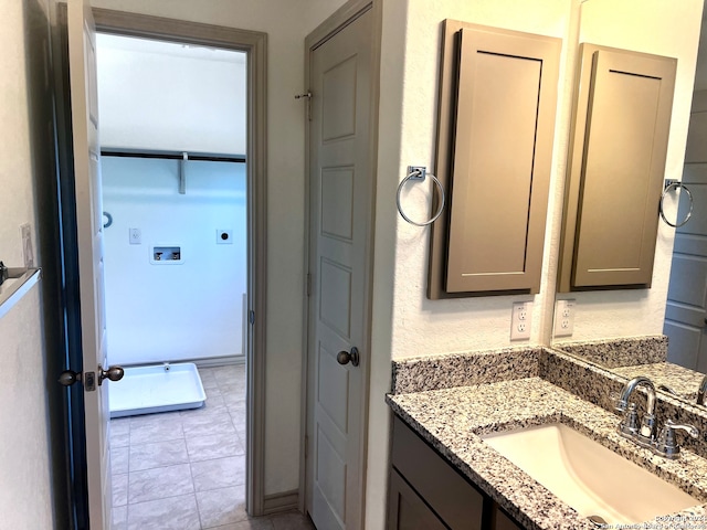 bathroom with vanity and tile patterned floors