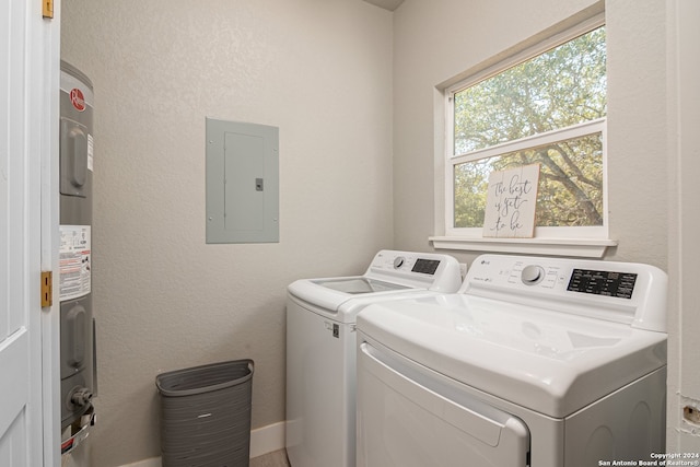 clothes washing area with independent washer and dryer and electric panel